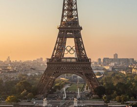 Photo of the Eiffel Tower displaying the Olympic rings
